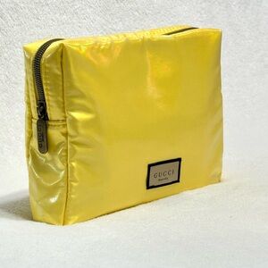 GUCCI yellow shimmer Cosmetics Bag.